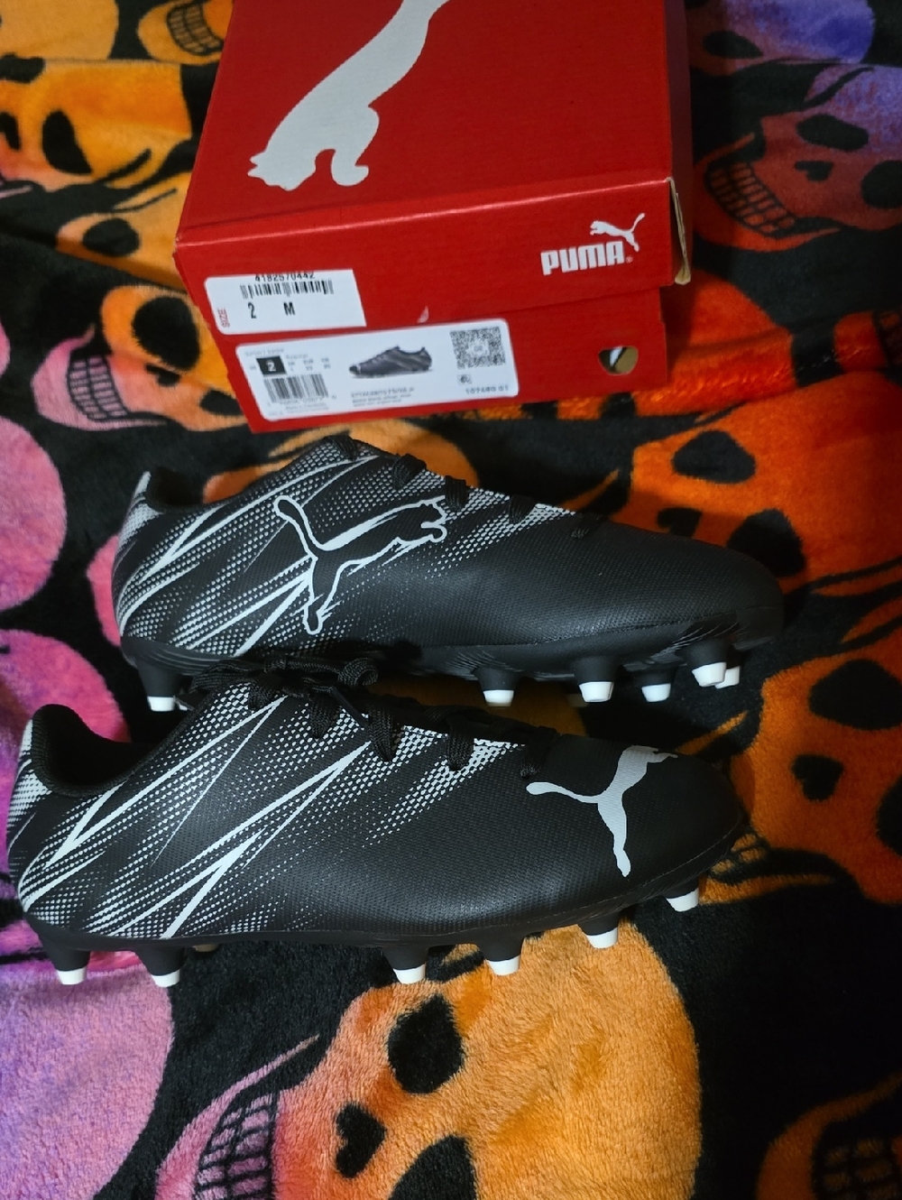 Puma Boys Black and White Soccer Cleats with Graphic Detail